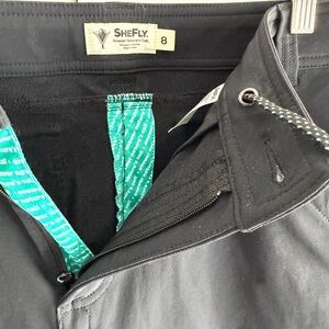 SheFly Black Pants with Teal Details